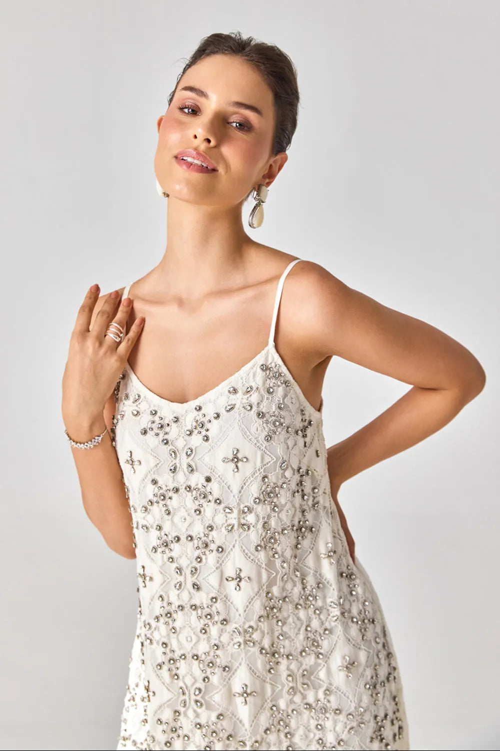 Rosa Anglasia Studded Dress women's statement dress featuring intricate studded embellishments and a feminine silhouette, designed to create an eye-catching look for festive celebrations, resort evenings, cocktail gatherings and special occasions.