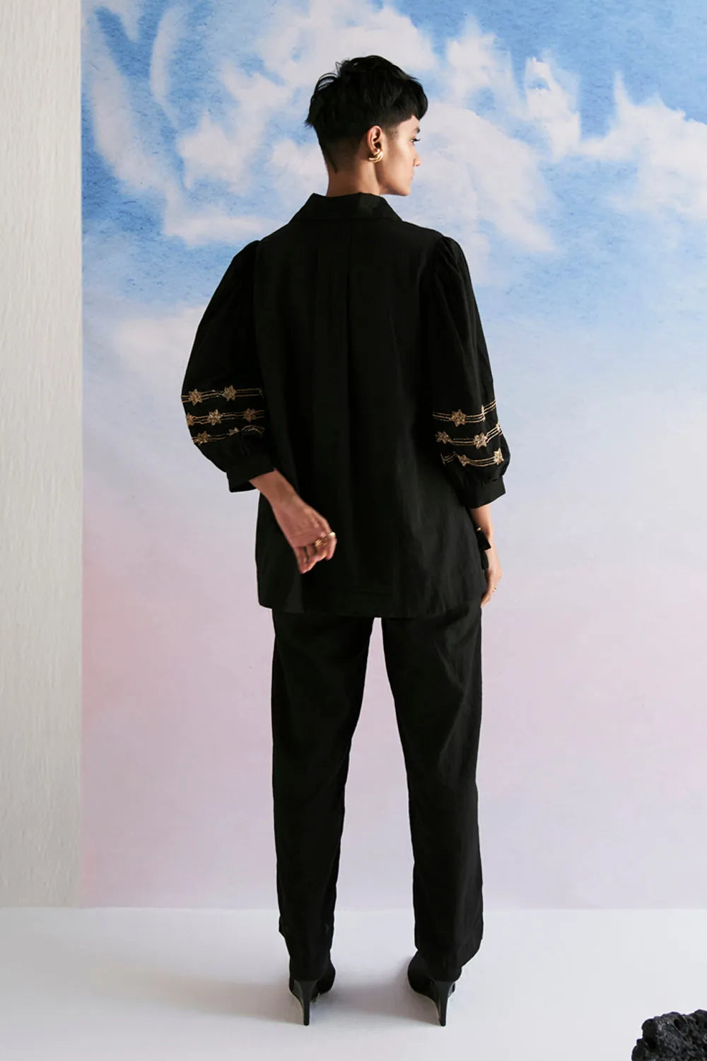 Rimi Shirt women's black cotton shirt featuring a relaxed silhouette, classic collared neckline, button-down front and clean contemporary styling, designed for comfortable everyday wear, styled for casual outings, travel days, brunches and smart-casual occasions.
