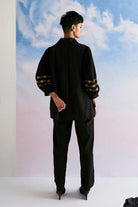 Rimi Shirt women's black cotton shirt featuring a relaxed silhouette, classic collared neckline, button-down front and clean contemporary styling, designed for comfortable everyday wear, styled for casual outings, travel days, brunches and smart-casual occasions.
