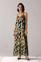 Romi Embroidered Lurex Dress women's statement dress featuring shimmering Lurex fabric, intricate embroidered detailing and an elegant flowing silhouette, styled for festive celebrations, resort evenings, cocktail gatherings and special occasions.