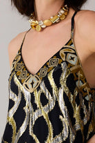 Romi Embroidered Lurex Dress women's statement dress featuring shimmering Lurex fabric, intricate embroidered detailing and an elegant flowing silhouette, styled for festive celebrations, resort evenings, cocktail gatherings and special occasions.