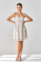 Rosa Anglasia Studded Dress women's statement dress featuring intricate studded embellishments and a feminine silhouette, designed to create an eye-catching look for festive celebrations, resort evenings, cocktail gatherings and special occasions.