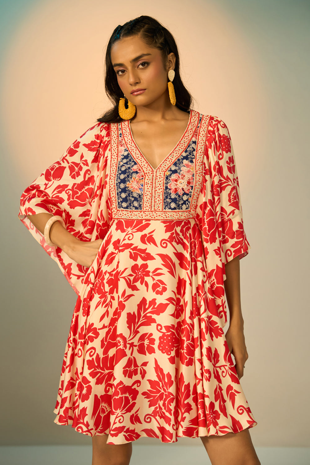 Shelly Embroidered Tunic women's multicolour modal satin mini tunic featuring a vibrant red and white poppy floral print, intricate embroidered detailing and a relaxed silhouette, styled for summer holidays, resort getaways, brunches and festive daytime occasions.