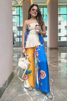 Simran Luthria wearing the Rey Blouse With Tiana Pants, a women's coordinated outfit featuring a statement blouse paired with matching Tiana pants, combining contemporary styling with a coordinated silhouette, suited for summer outings, resort vacations, brunches and casual celebrations.
