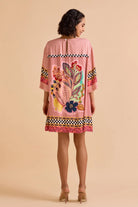 Zion Dress women's statement dress featuring a contemporary silhouette and distinctive design details, styled for summer outings, resort vacations, brunches and special occasions.