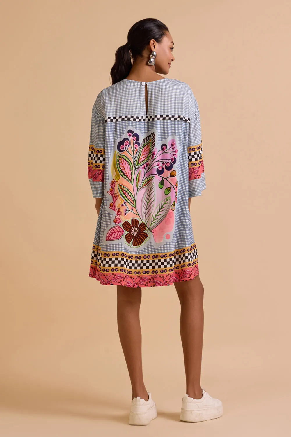 Ziva Dress women's statement dress featuring an elegant silhouette and contemporary detailing, styled for summer brunches, resort vacations, daytime celebrations and special occasions.